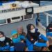 Petugas vaksinasi Liukang Kalmas Kabupaten Pangkep di atas kapal yang menuju Pulau Dewakkang, Kabupaten Pangkajene Kepulauan, Sulsel duduk berdampingan  saat bertugas beberapa waktu lalu.