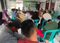 Pemuda Batupapan bersama aparat desa serta masyarakat melakukan musyawarah membahas mekanisme pasar tradisional, Sabtu (28/8/2022).