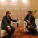 Gubernur Sulsel, Andi Sudirman Sulaiman berbincang akrab dengan Menteri Muda Singapura, Desmond Lee,  di sela World Cities Summit (WCS), Senin, (1/8/2022)