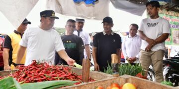 Pemprov Sulsel dan Pemkab Bone menggelar pasar murah di Kawasan Stadion La Patau, Minggu, (19/11/2023). (Sumber: Humas Pemprov Sulsel)