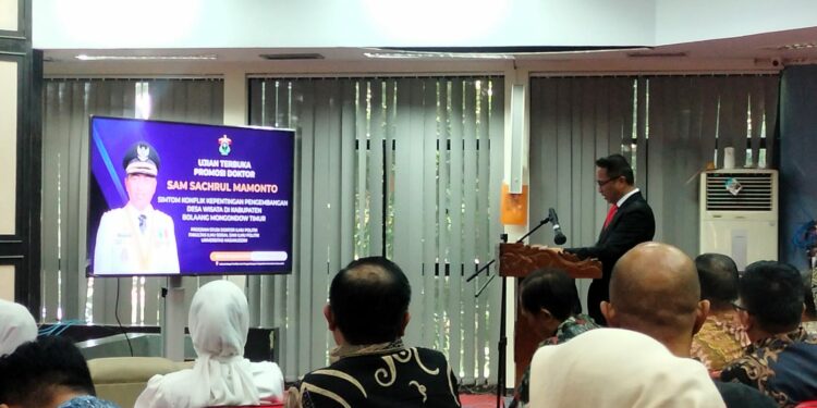 Bupati Bolaang Mongondow Timur Promosi Doktor Ilmu Politik, Raih Cumlaude Bupati Bolaang Mongondow Timur Promosi Doktor Ilmu Politik, Raih Cumlaude